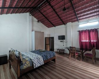 Vinsons Cottages - Colva - Slaapkamer