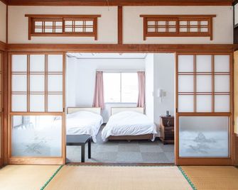 Hotel Tsuru Sendai - Satsumasendai - Bedroom