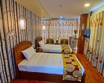 Royal Pearl Hotel - מנדאליי - חדר שינה