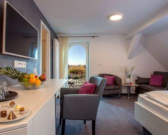 Ebner - Boutique-Hotel & Konditorei - Lindau - חדר שינה