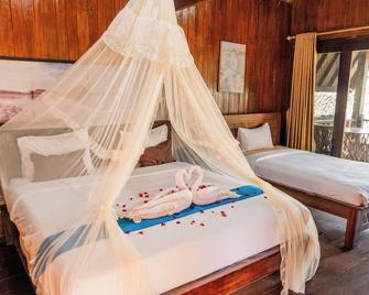 Yoki's Bungalows - Kuta - Bedroom