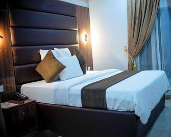 Binos Inn Hotel and Suites - Benin City - Bedroom