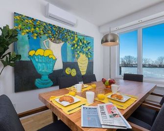 Hôtel à la maison - L'Insulaire, Spa et Vue - Saint-Pierre-de-l'Île-d'Orléans - Comedor