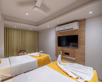 Hotel Classique, Rajkot - Rajkot - Slaapkamer