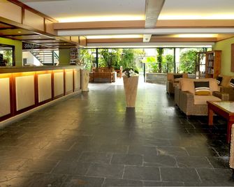 Bay Village Tropical Retreat & Apartments - Cairns - Vastaanotto