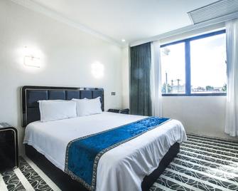 Star Sands Hotel - Garapan - Bedroom