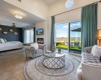 Domaine Chardonnay, one of Temecula Wine Country's premier residential properties, is an exclusive, privately operating, winery estate Bed & Breakfast with 3 beautifully appointed, independent guest suites for overnight accommodations, each featuring - Temecula - Living room