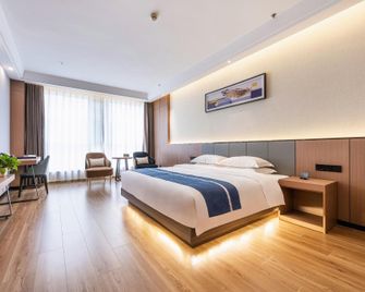 Kangle International Hotel - Linxia - Bedroom