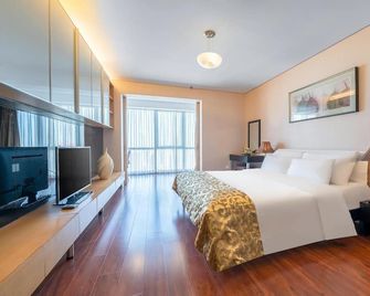 Qingdao Housing International Hotel - Qingdao - Yatak Odası
