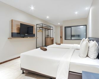 Hotel Kalisma - ג'קרטה - חדר שינה