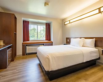 Microtel Inn & Suites by Wyndham Cheyenne - שאיין - חדר שינה