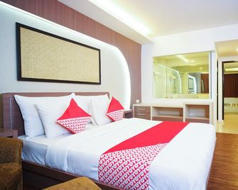 Collection O 166 Hotel Princess - Palembang - Schlafzimmer