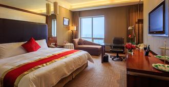 Changsha Xiaoxiang Huatian Hotel - Changsha - Bedroom