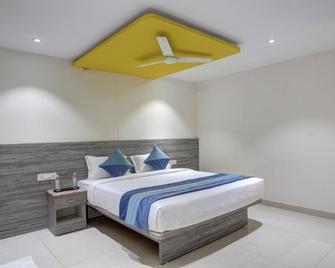 Orange Suites Airport Transit Stay - Bengaluru - Bedroom