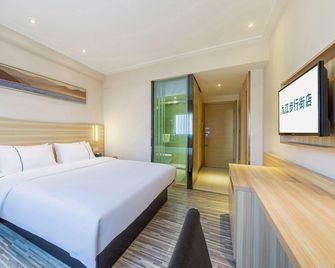 City Gengjie Hotel (Jiujiang Xiangyang Road Pedestrian Street Branch) - جيوجيانغ - غرفة نوم