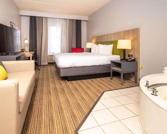 Country Inn & Suites by Radisson, Rapid City, SD - Rapid City - Yatak Odası