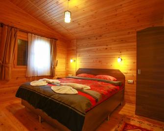 Baris Pension & Bungalows - צ'יראלי - חדר שינה