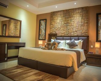 فندق مطعم وسبا أواسيز - Grand'Anse Praslin - غرفة نوم