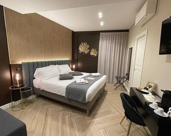 بومبييي سنترال هوم - بومباي - غرفة نوم