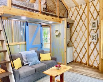Elevated eclectic yurt with wrap-around porch, hot tub, and mountain view! - Hillsville