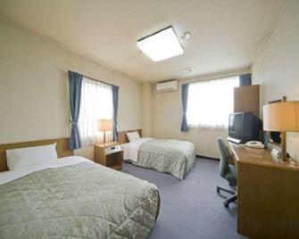 Business Hotel Art Plaza - Ōta - Schlafzimmer
