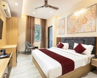 Asar Varanasi Junction by Orion Hotels - Варанасі - Спальня