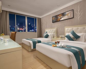 Kaiserdom Hotel Baiyun Airport-24-hour Airport-Free shuttle bus - גואנגג'ואו - חדר שינה