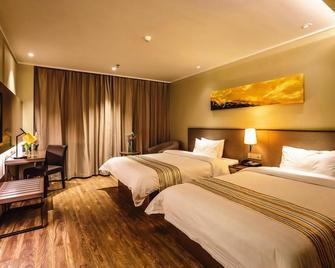 Home Inn Plus Dalian Development Zone Wanda Plaza Jinma Road - Даліан - Спальня