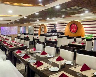 Emporio Hotel - Халдвані - Ресторан