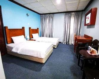 Kesedar Hotel Travel & Tours Sdn Bhd - Gua Musang - Bedroom