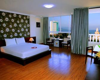 Nice Swan Hotel - Nha Trang - Schlafzimmer