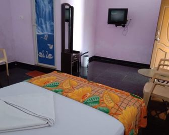 Rainbow Guest House - Mamallapuram - Schlafzimmer