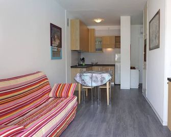 Flat with shared pool-Beahost - Caorle - Living room