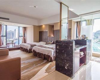 Created Ashton Business Hotel - Wuzhou - Bedroom