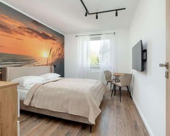 Family Apartment in Kolobrzeg by Renters - Kolobrzeg - Habitación