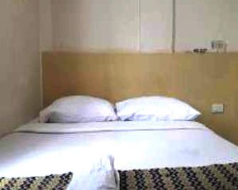 Express O 91674 Penginapan Bm Prima - Duri - Bedroom