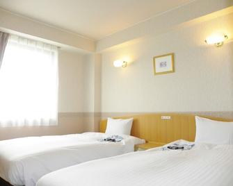 Nonsmoking Spacious Twin Room Lan Connection Fre / Yonezawa Yamagata - Yonezawa - Slaapkamer