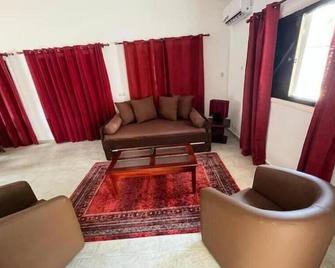 Villa Havana Suits Mondoukou - Assinie-Mafia - Salon