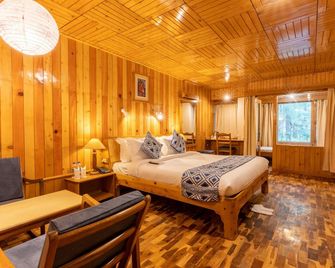 هوتل نيجيس مايفلاور - مانالى - غرفة نوم