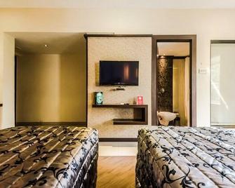 Hotel Capitol - Thane - Yatak Odası