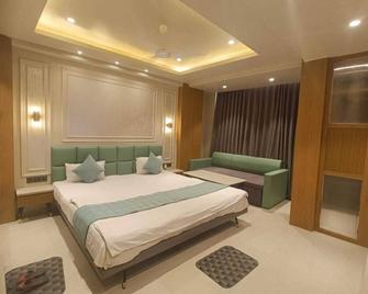 Hotel Utkarsh - Pachmarhi - Phòng ngủ