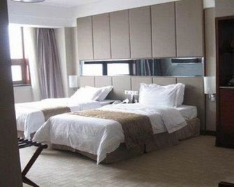 Jinan Blue Horizon Hotel Shizhong - Jinan - Bedroom