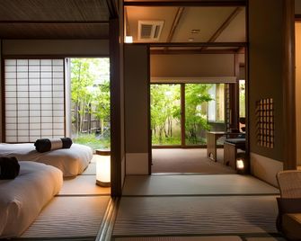Takamiya Ryokan Sanshuyu - Nan'yo - Huiskamer