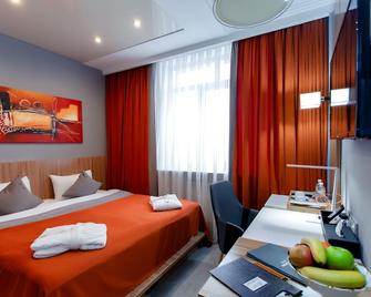 Mildom Premium Hotel - Almaty - Bedroom