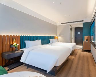Qingmu Zhuxuan Hotel (Wanda Yintai City Branch) - Bengbu - Bedroom