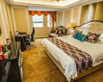 Bin Li Uptown Hotel - Yibin - Schlafzimmer