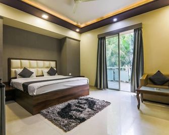 Magnus Vosiv Suites - Pune - Bedroom