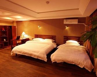 Epro Business Hotel - ยานไถ - ห้องนอน