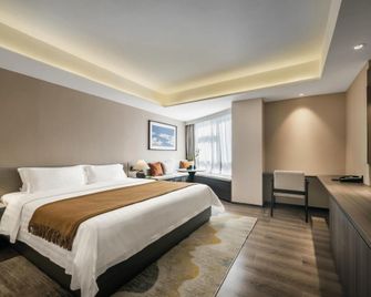 Huaweida Hotel - Guangzhou - Bedroom