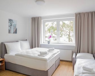 Homaris Apartments Nibelungen - פרנקפורט אם מיין - חדר שינה